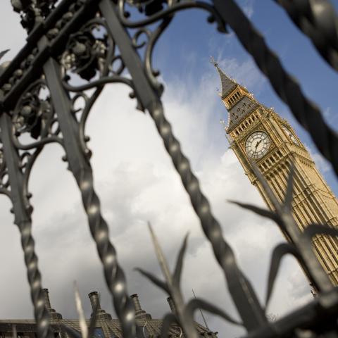Big Ben UK Parliament viewed through iron gates